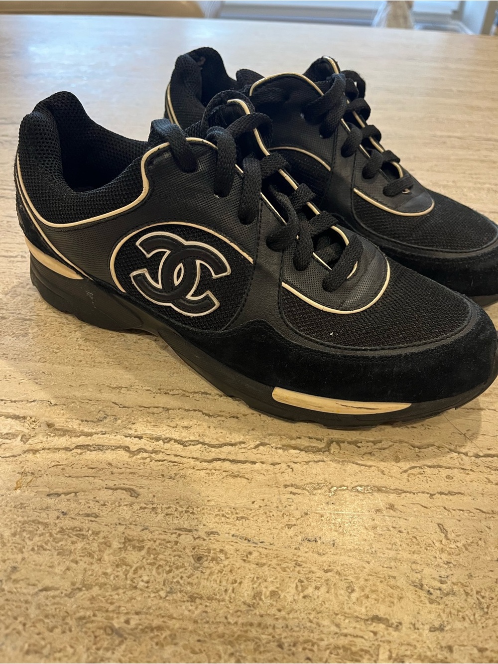 CHANEL Black Sneakers with Beige Trim and CC Logo